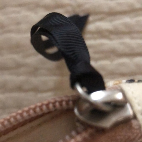 Mango clutch. Textured geometric pattern. Zip top w/ black grosgrain ribbon pull - Picture 10 of 11